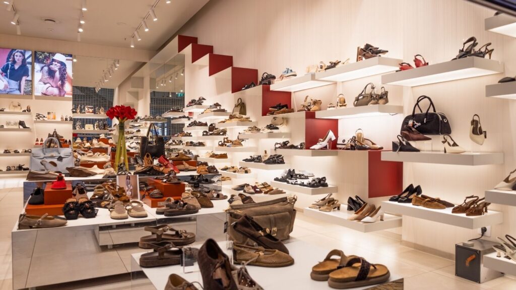 Sneakers, shoes shops showroom for malls by jivan furniture interiors